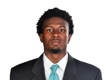 Karmello English headshot