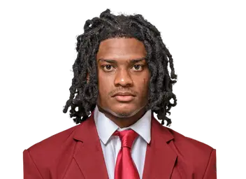 Maleek Huggins headshot
