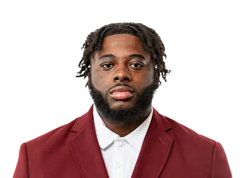 Malik Denkins headshot