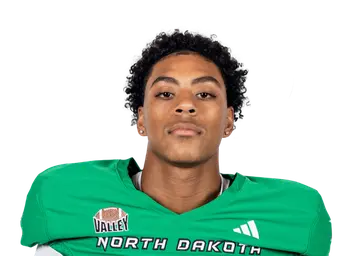 Korey Tai headshot