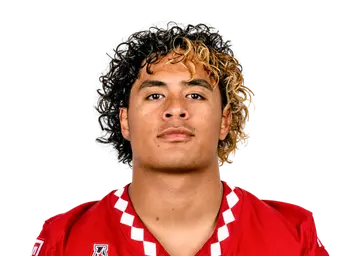 Tyree Alualu headshot