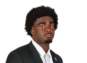 Quincy Byas headshot