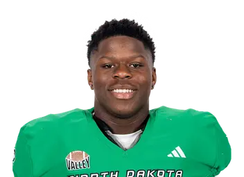 Charles Langama headshot
