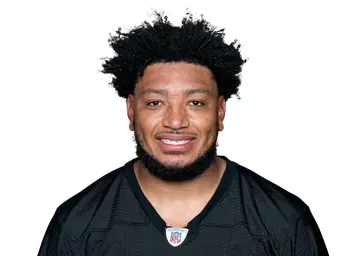 Malik Harrison headshot