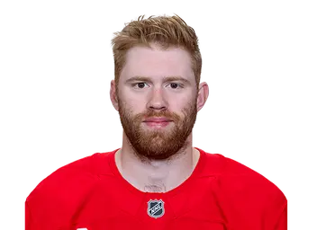 J.T. Compher headshot